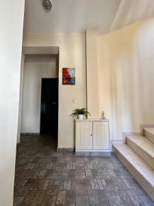 Fotografie z fotogalerie ubytování Cozy Apartments Mc Queen v Aténách