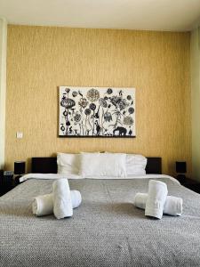 Posteľ alebo postele v izbe v ubytovaní Cozy Apartments Mc Queen