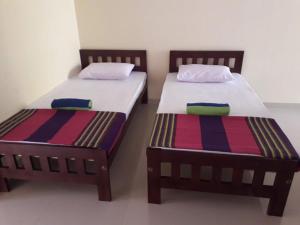 Letto o letti in una camera di Blue Point Rest