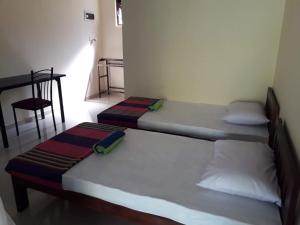 Letto o letti in una camera di Blue Point Rest