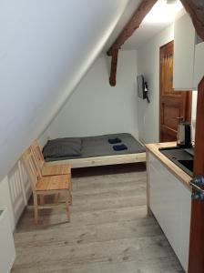 Postel nebo postele na pokoji v ubytování Agroturystyka Ranczo Gościszów