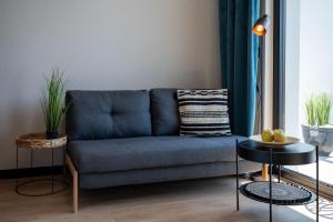Posezení v ubytování Domki i apartamenty Skandynawia z basenem