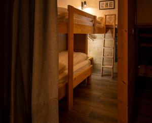Palanda nebo palandy na pokoji v ubytování La Bergère