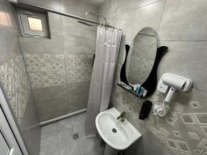 Baðherbergi á Hotel Elit