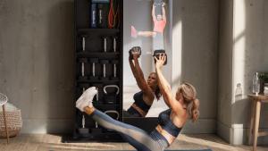two women doing pilates in front of a mirror at The Lab Experiments in Thun