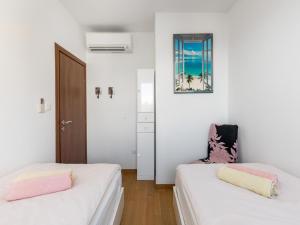 Posteľ alebo postele v izbe v ubytovaní Beachside Comfort in Split