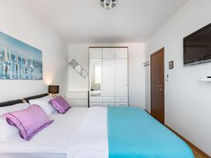 Posteľ alebo postele v izbe v ubytovaní Beachside Comfort in Split