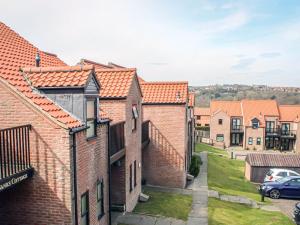 a view of a row of brick houses at The Cinder Warren in Whitby
