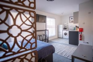 Kuchyň nebo kuchyňský kout v ubytování Cosy 1 Bed Apartment in the heart of Norwich