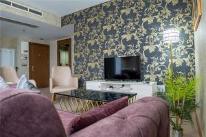 TV a/nebo společenská místnost v ubytování My Palace Rooms SAW