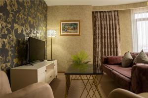 TV a/nebo společenská místnost v ubytování My Palace Rooms SAW