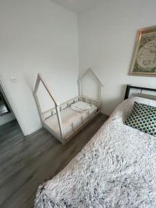 Letto o letti in una camera di Le Bel Vue