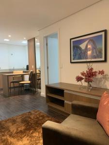 Uma TV ou centro de entretenimento em Nobile Hotel Belo Horizonte
