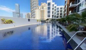 Bazén v ubytování 1BR Luxury Apartment Pantheon Elysee 1 - JVC nebo v jeho okolí