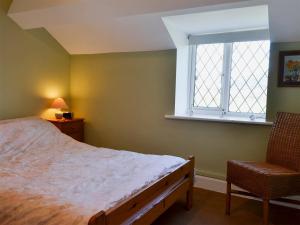 Postel nebo postele na pokoji v ubytování Tan Y Lyn Cottage