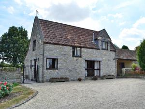 an old stone house with a roof at Fox Cottage - E4510 in Chipping Sodbury