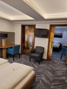TV a/nebo společenská místnost v ubytování Hotel Hessenhof