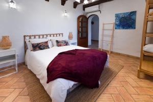 Un pat sau paturi într-o cameră la Villa Casa Velha +17 fotografii