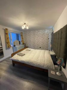 En eller flere senge i et værelse på Borthwick Farm Cottage Annex