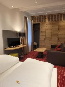 Postel nebo postele na pokoji v ubytování Hotel Hessenhof