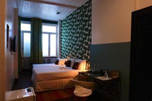 Katil atau katil-katil dalam bilik di Aram Yamí Boutique Hotel