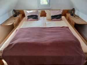 Postel nebo postele na pokoji v ubytování Ferienhaus Ankerplatz 1