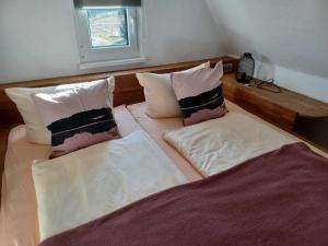Postel nebo postele na pokoji v ubytování Ferienhaus Ankerplatz 1