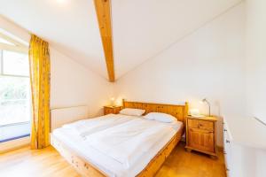 Postel nebo postele na pokoji v ubytování Morgensonne