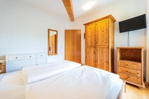 Postel nebo postele na pokoji v ubytování Morgensonne