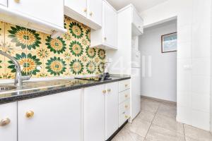 Kuchyň nebo kuchyňský kout v ubytování Apartamento Los Molinos