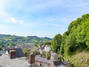 an aerial view of a town with houses and trees at Pear Tree Cottage in Wirksworth