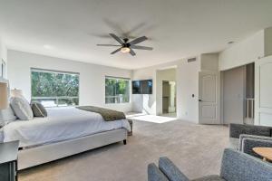 a bedroom with a bed and a ceiling fan at Spacious Scottsdale Home with Private Pool! in Phoenix