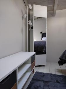 Postel nebo postele na pokoji v ubytování Vrachos Suites