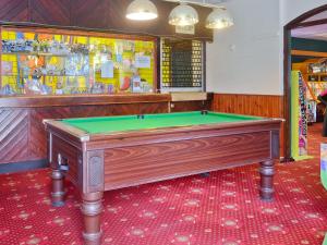 a billiard table in a room with at Gracelands in Uny Lelant