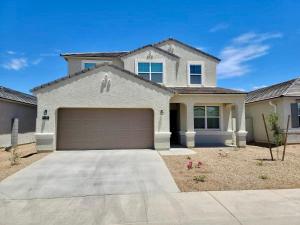 a large white house with a garage at Phoenix Comfort home II in Phoenix