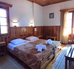 Voodi või voodid majutusasutuse HOTEL MARI Metsovo toas