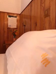 Voodi või voodid majutusasutuse HOTEL MARI Metsovo toas