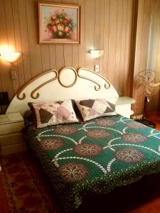 Ένα ή περισσότερα κρεβάτια σε δωμάτιο στο Hotel Di Maurier +6 φωτογραφίες