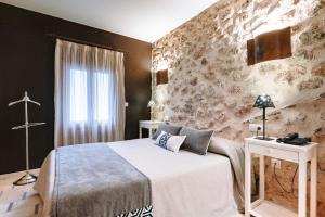 Posteľ alebo postele v izbe v ubytovaní Hotel Casa Babel