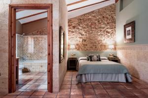 Posteľ alebo postele v izbe v ubytovaní Hotel Casa Babel