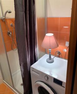 Koupelna v ubytování Regal beach + 1 fotografie