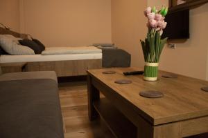 Postel nebo postele na pokoji v ubytování Apartmány Pilot + 4 fotografie