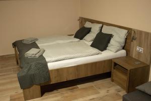 Postel nebo postele na pokoji v ubytování Apartmány Pilot