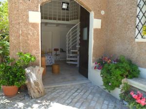 Φωτογραφία από το άλμπουμ του Bilocale in villa a pochi passi dal mare σε Leuca +8 φωτογραφίες