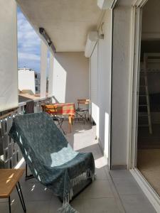 Posedenie v ubytovaní Chez Isabelle et Virgile Bel appartement, avec vues, à 50m de la plage