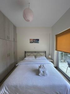 Un pat sau paturi într-o cameră la Villa Eva 2