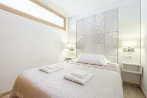 Postel nebo postele na pokoji v ubytování Carabelas 3-61 Levante Beach