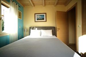 Posteľ alebo postele v izbe v ubytovaní Seaside Cottage