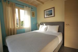 Posteľ alebo postele v izbe v ubytovaní Seaside Cottage
