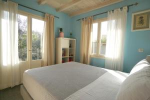 Posteľ alebo postele v izbe v ubytovaní Seaside Cottage